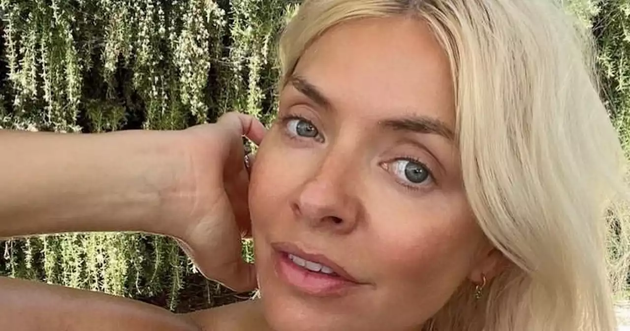 Make-up free Holly Willoughby stuns as she soaks up the sun in strapless bikini