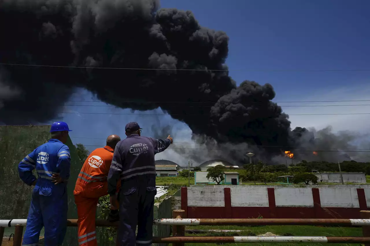 17 missing, 121 hurt as fire rages in Cuban oil tank farm