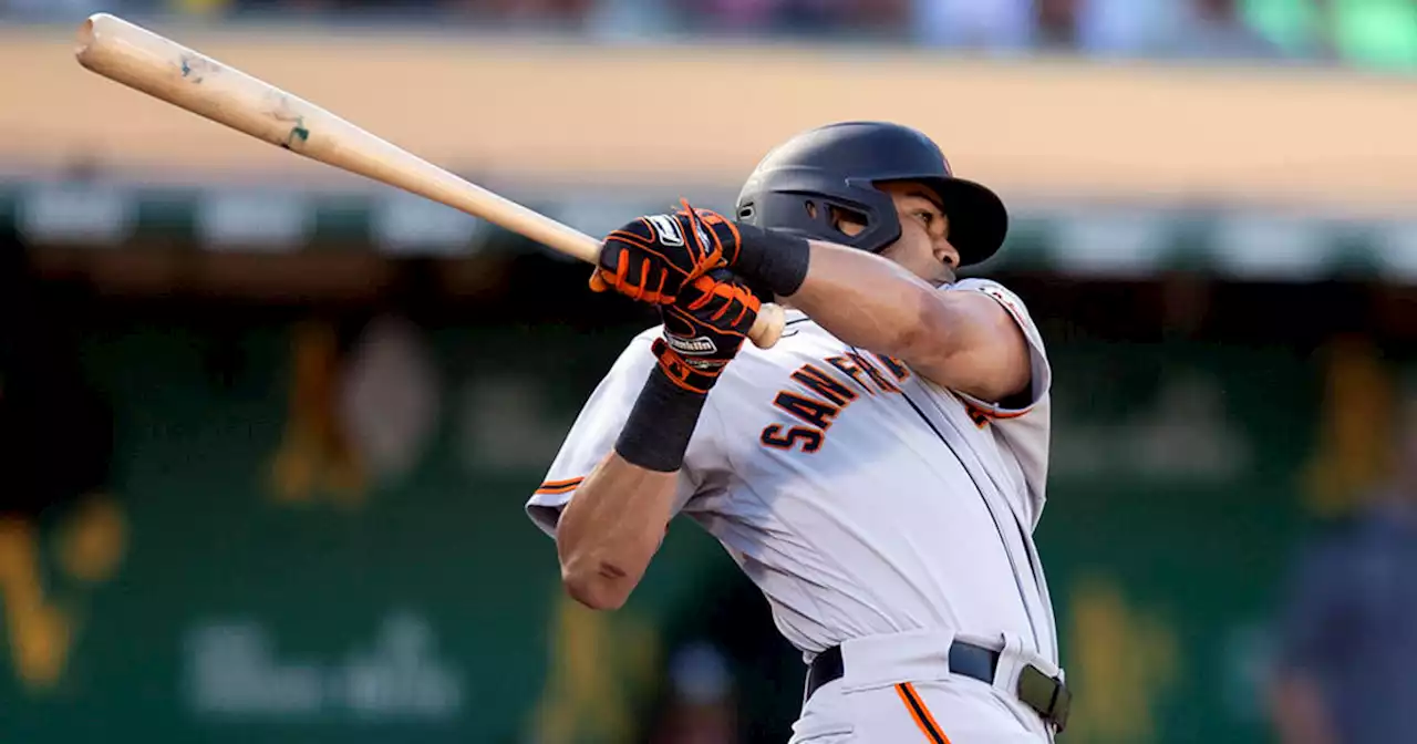 Giants bust out of slump, beat A's 7-3