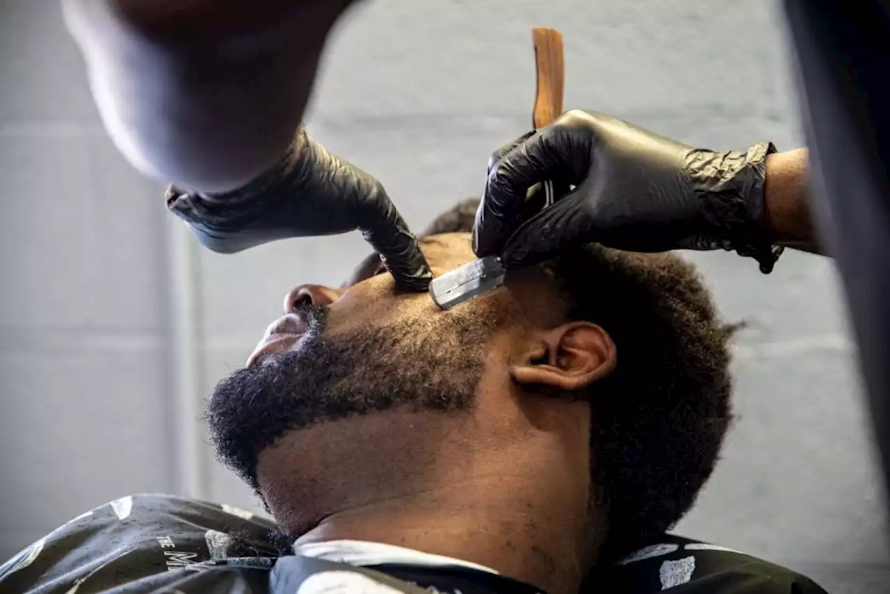 Barbers provide space for young Black men and boys to talk