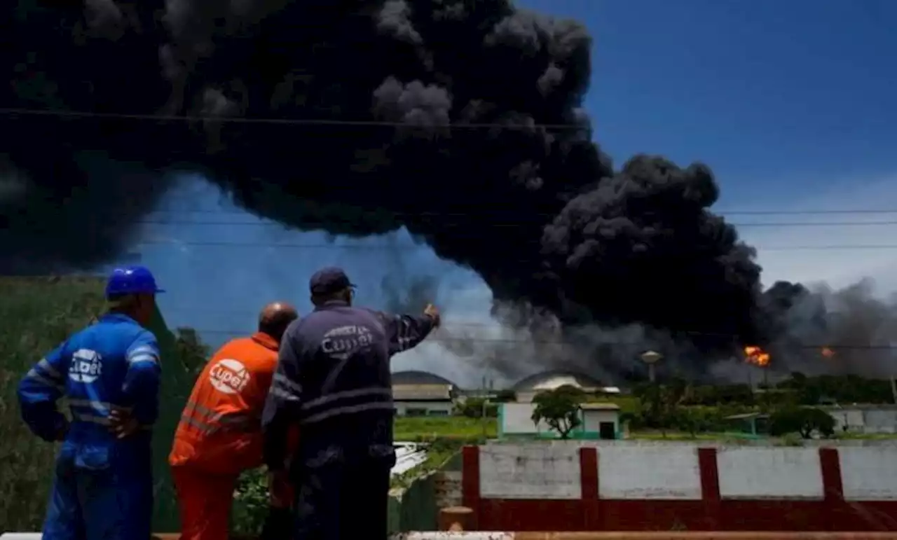Third fuel tank collapses as helicopters battle Cuban blaze