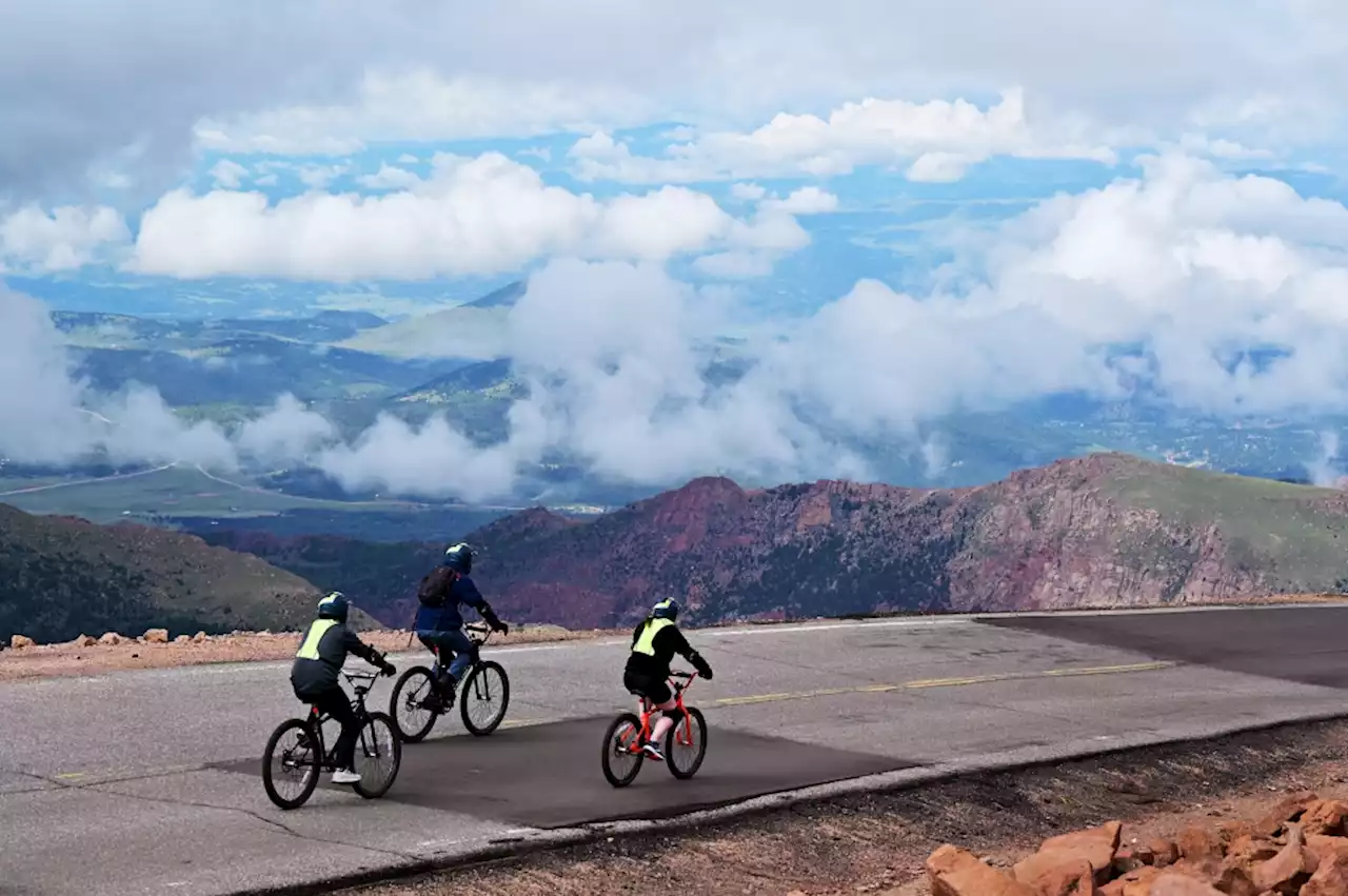 Take a train to the summit of Pikes Peak — then ride a bike 13 miles (and 5,000 feet) back down