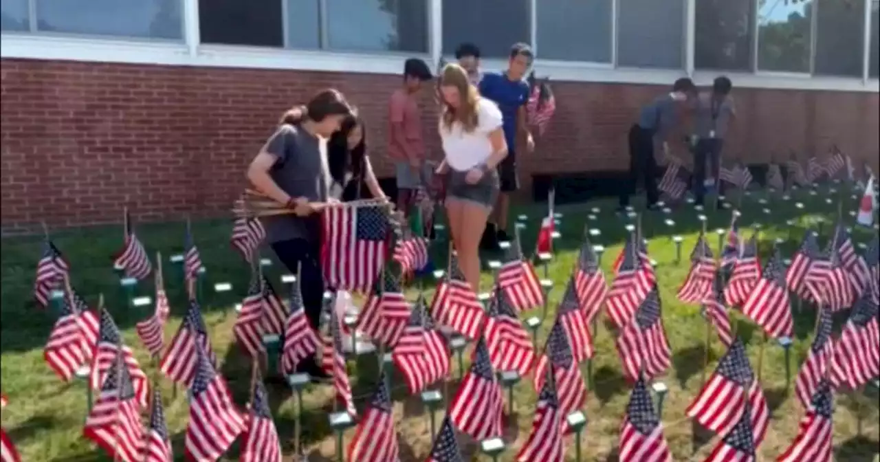 Cedar Grove High School students line lawn with flags to remember 9/11 victims