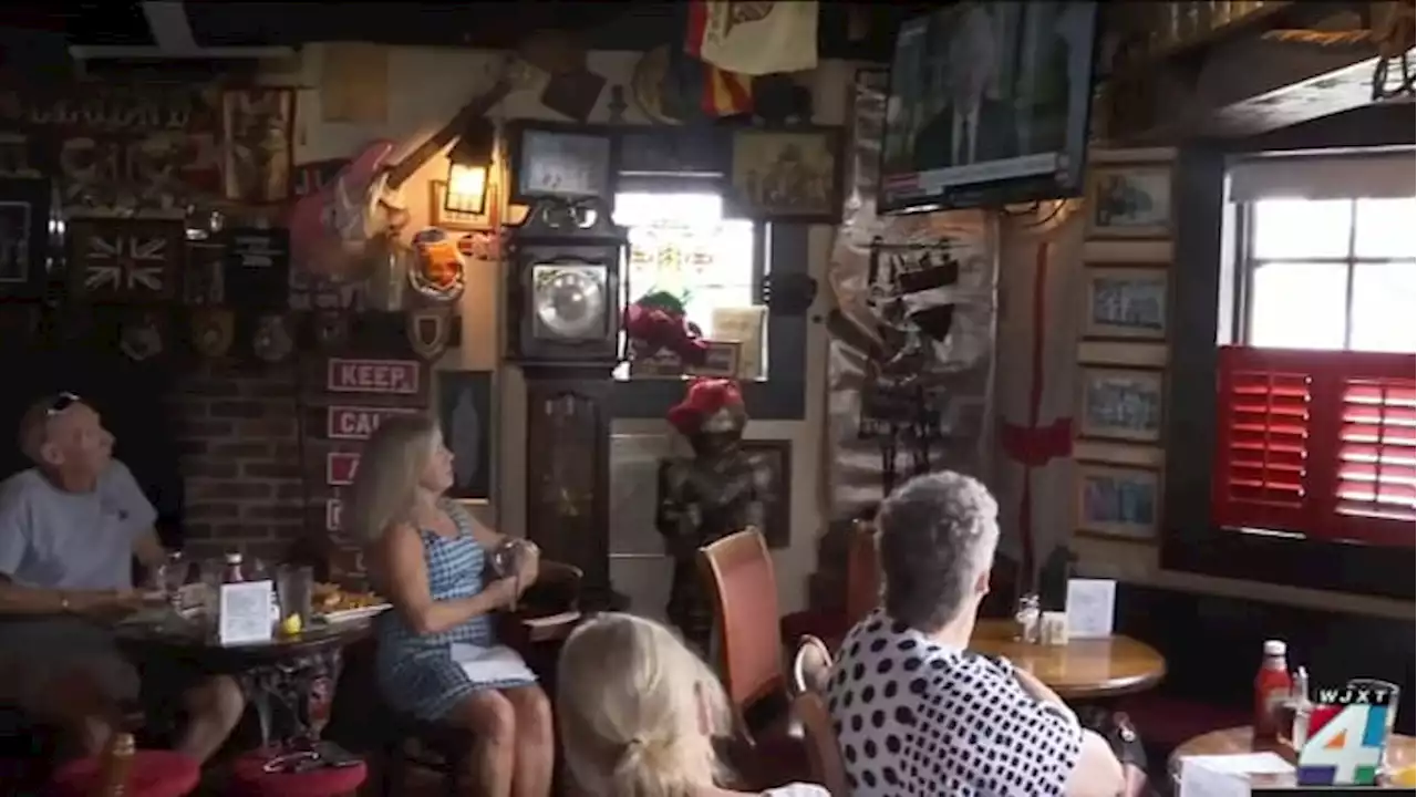 People gather at British pub in St. Augustine area to watch King Charles III deliver 1st address since death of Queen Elizabeth II