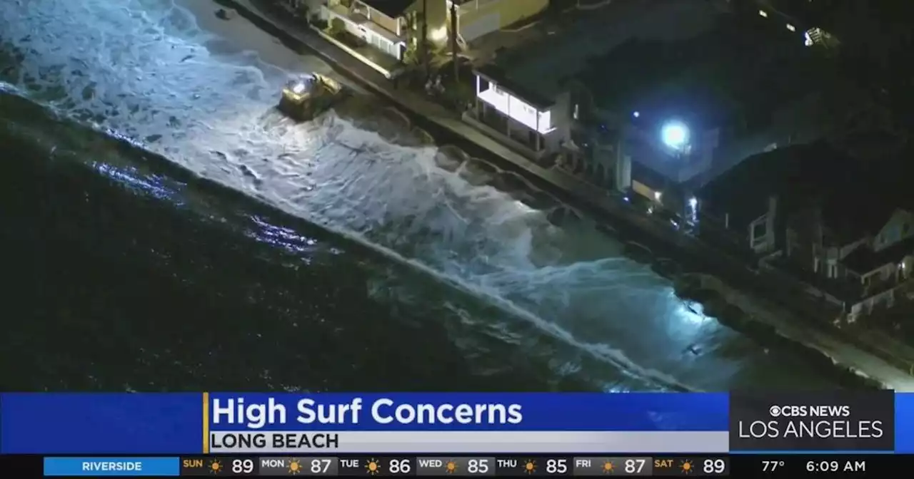 Crews work to block potential flooding in Long Beach amid high tide