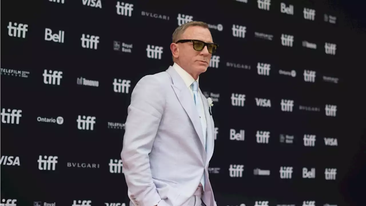 Daniel Craig says he was 'very lucky' to work with Queen Elizabeth II