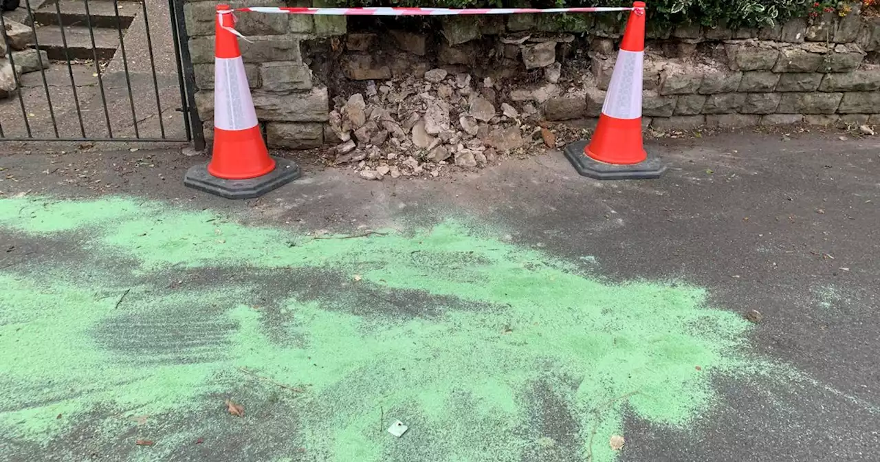 Damage left in street after police rush to scene of crash