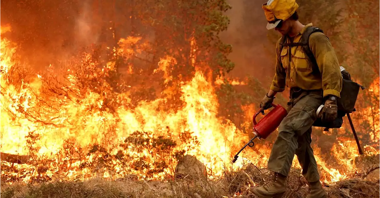 Rain helps California firefighters combat blaze, ends brutal heat wave