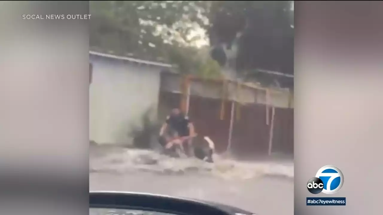 Caught on video: 2 women, child rescued from floodwaters in San Bernardino