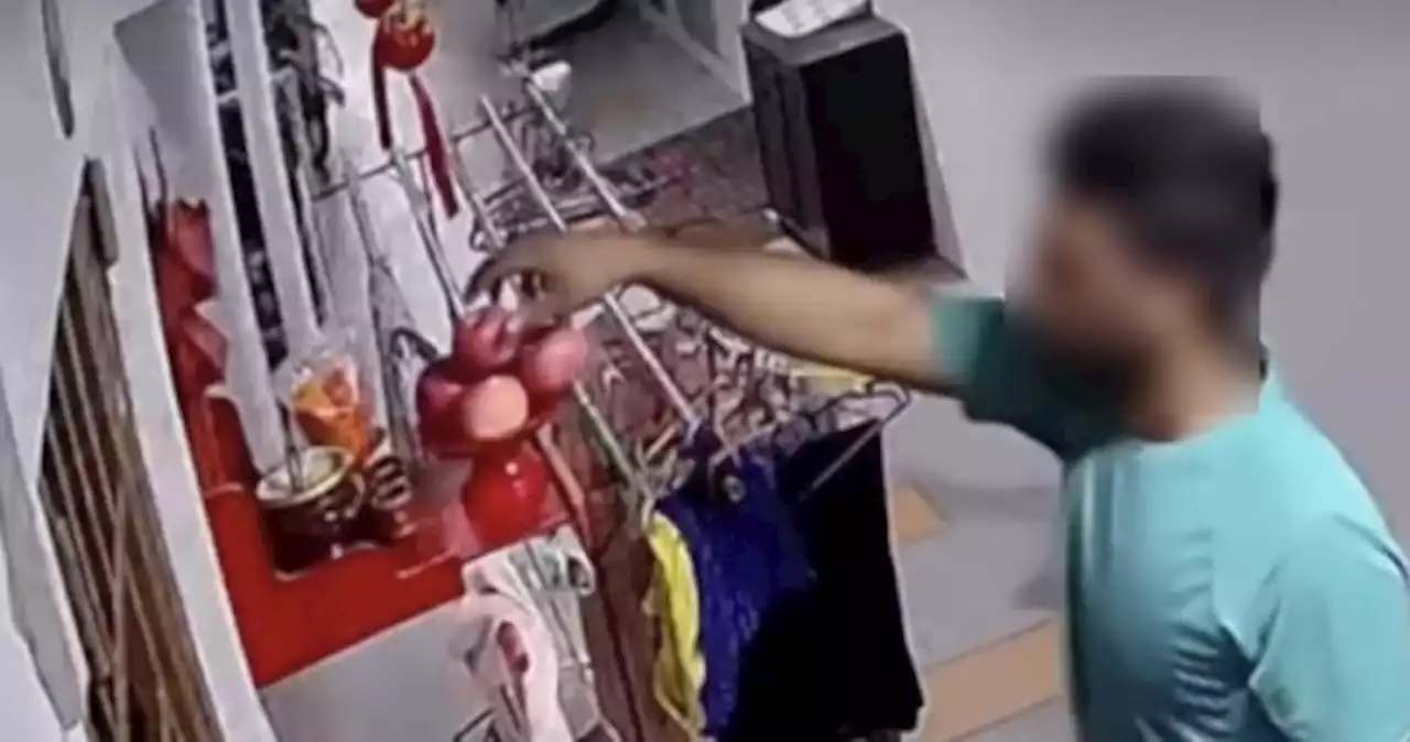 'At least he asked for permission': Man filmed taking altar offerings along HDB corridor