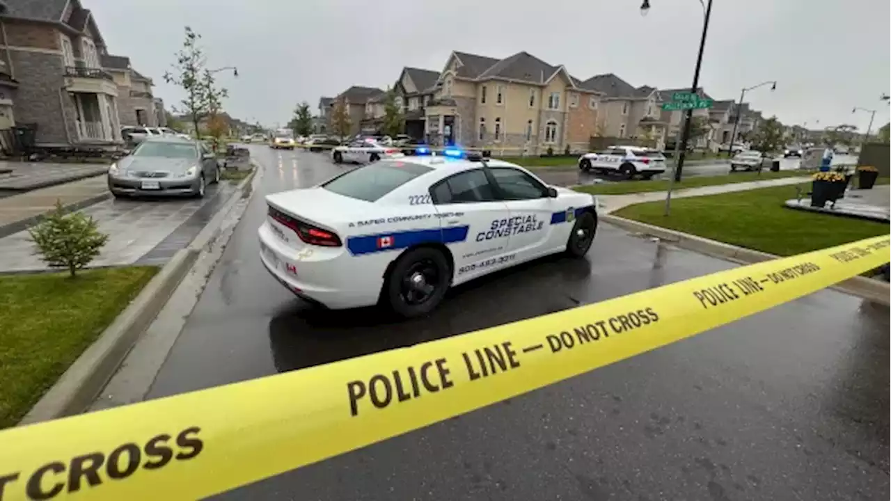 Man shot and killed inside vehicle in driveway of Brampton home | CBC News