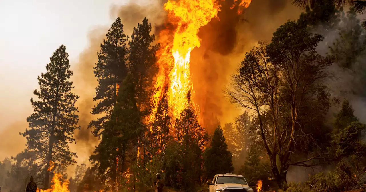 Western wildfires leave 14,000 people under evacuation orders, but cooling weather starts to help