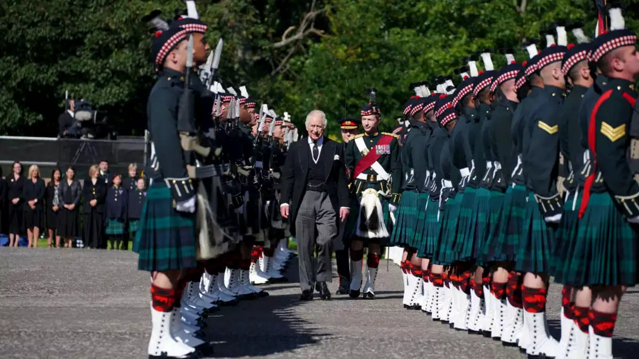 King Charles leads royal procession of queen's coffin in Scotland