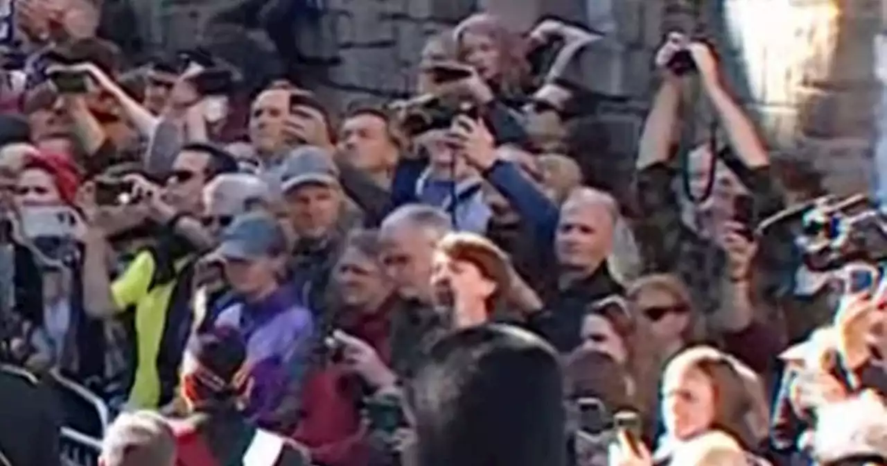 Crowds drag screaming protester away as Queen's coffin goes through Edinburgh