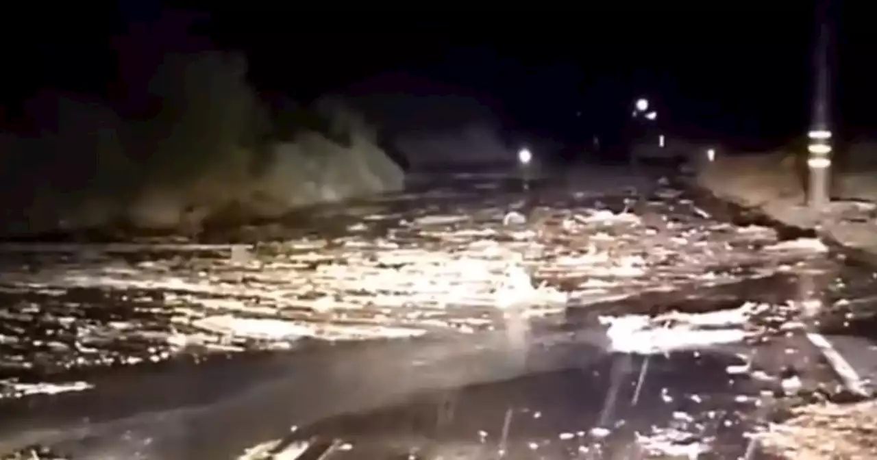 Dozens of drivers trapped by mudslides as heavy rain, flash floods soak California