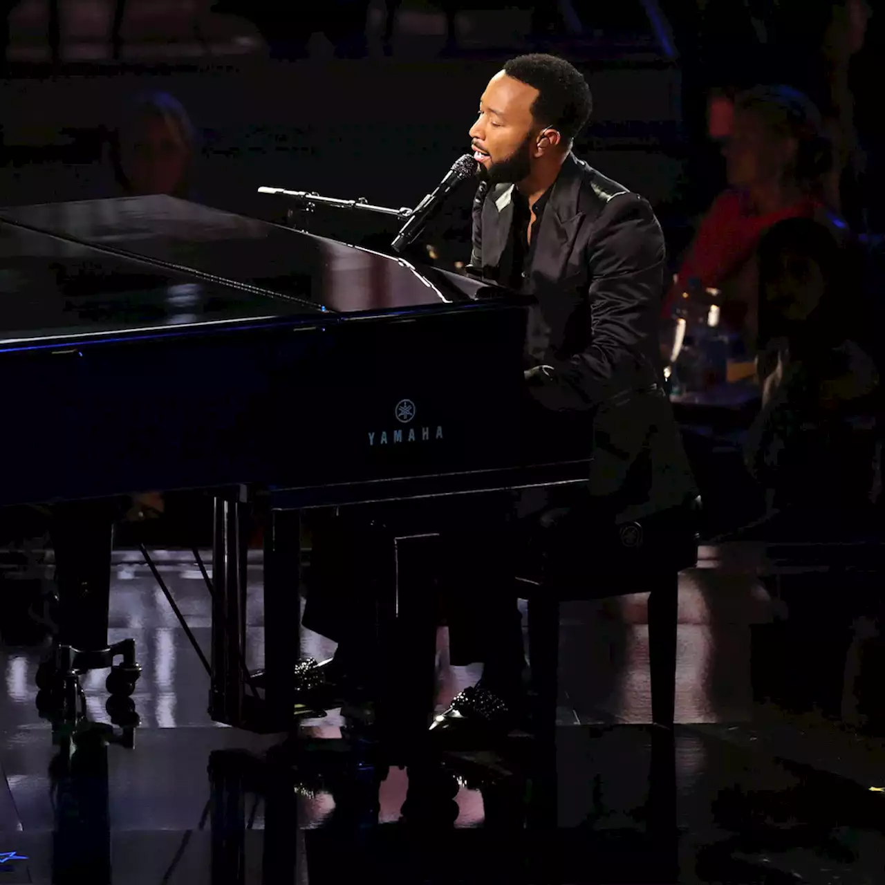 Emmys 2022: John Legend Performs 'Pieces' During In Memoriam Tribute to Betty White, Bob Saget and More - E! Online