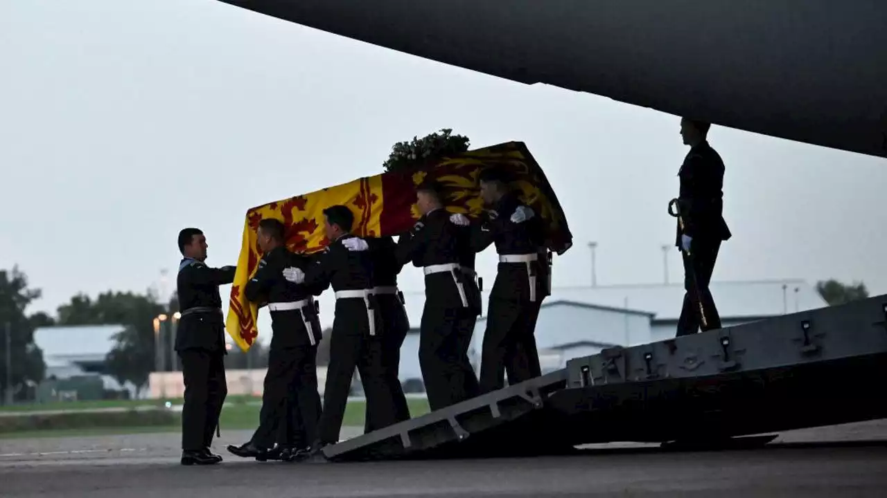 Queen Elizabeth II’s coffin arrives in London as crowds gather to pay their respects