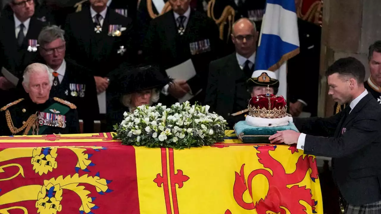 King Charles escorts coffin in Scotland as queen hailed a 'constant in all our lives'