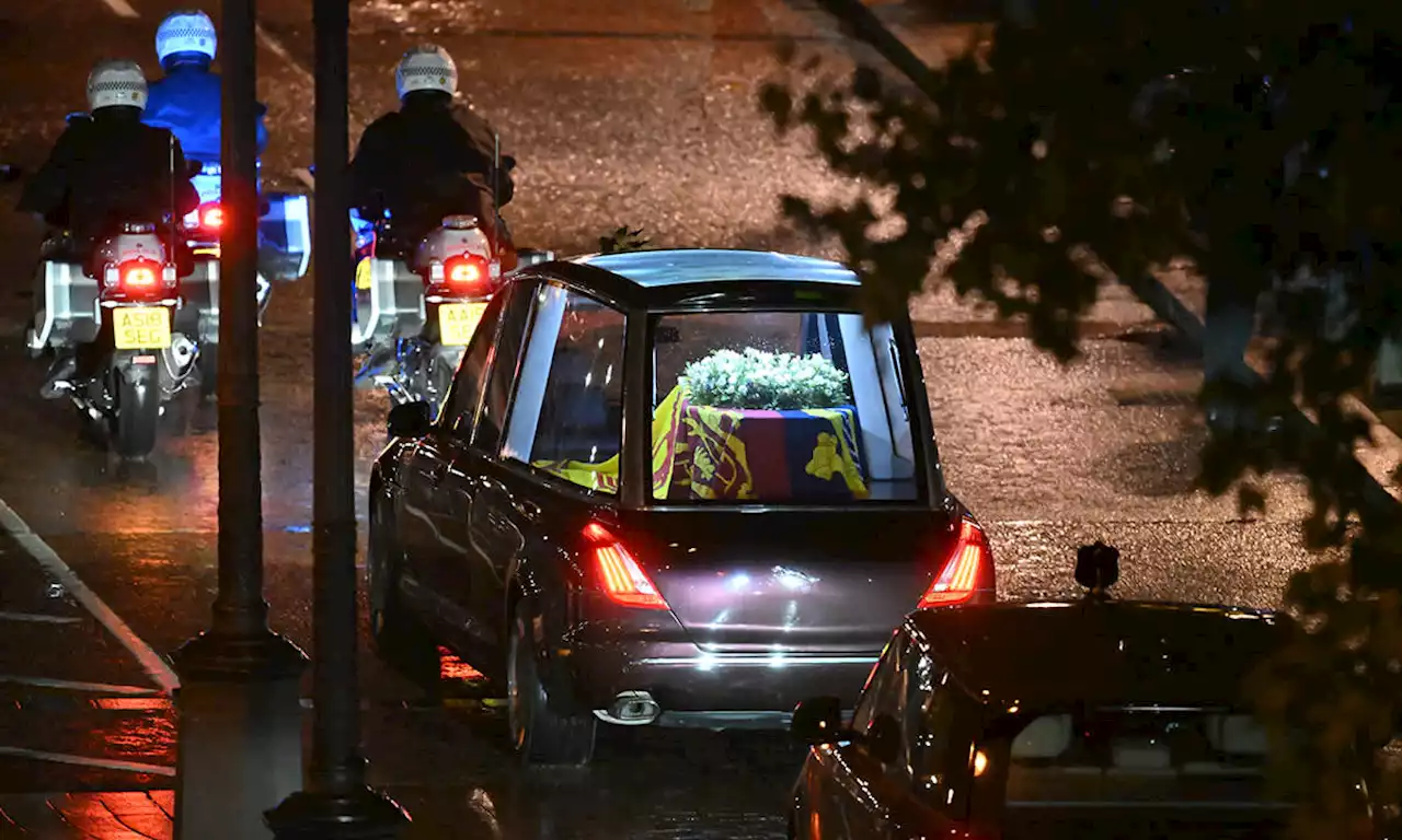 The Queen's coffin arrives at Buckingham Palace in touching moment - best photos