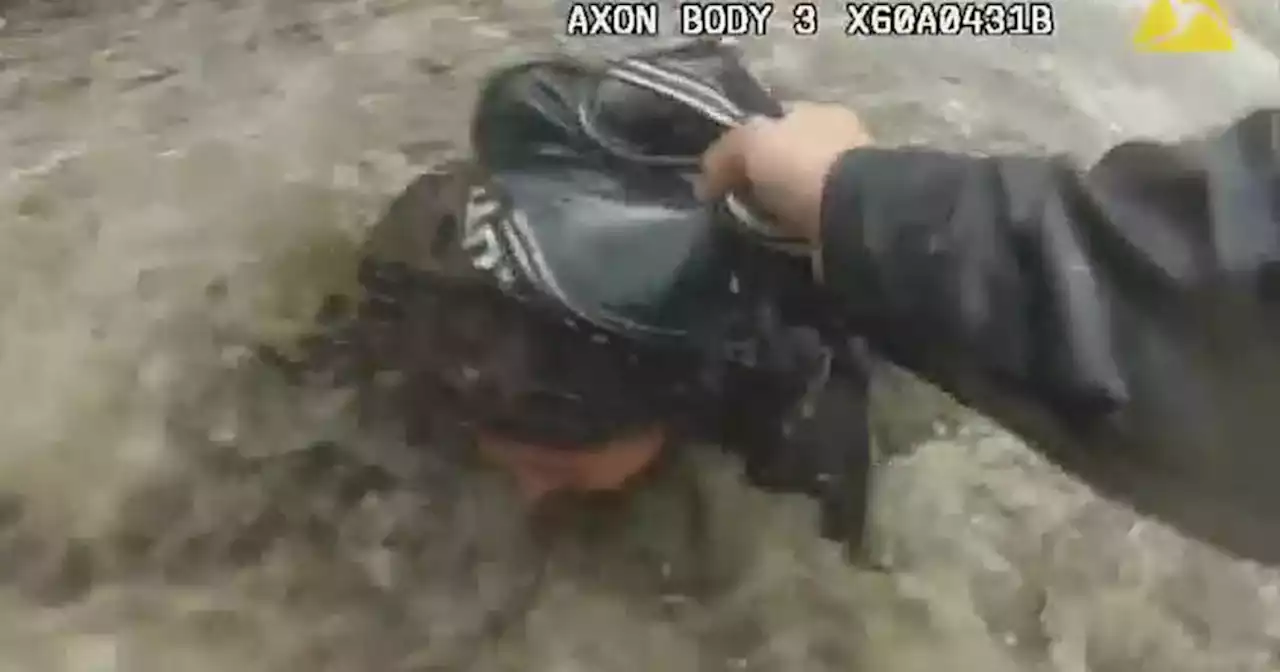 Caught on video: San Bernardino officers rescue mother, 2 children from flash floods