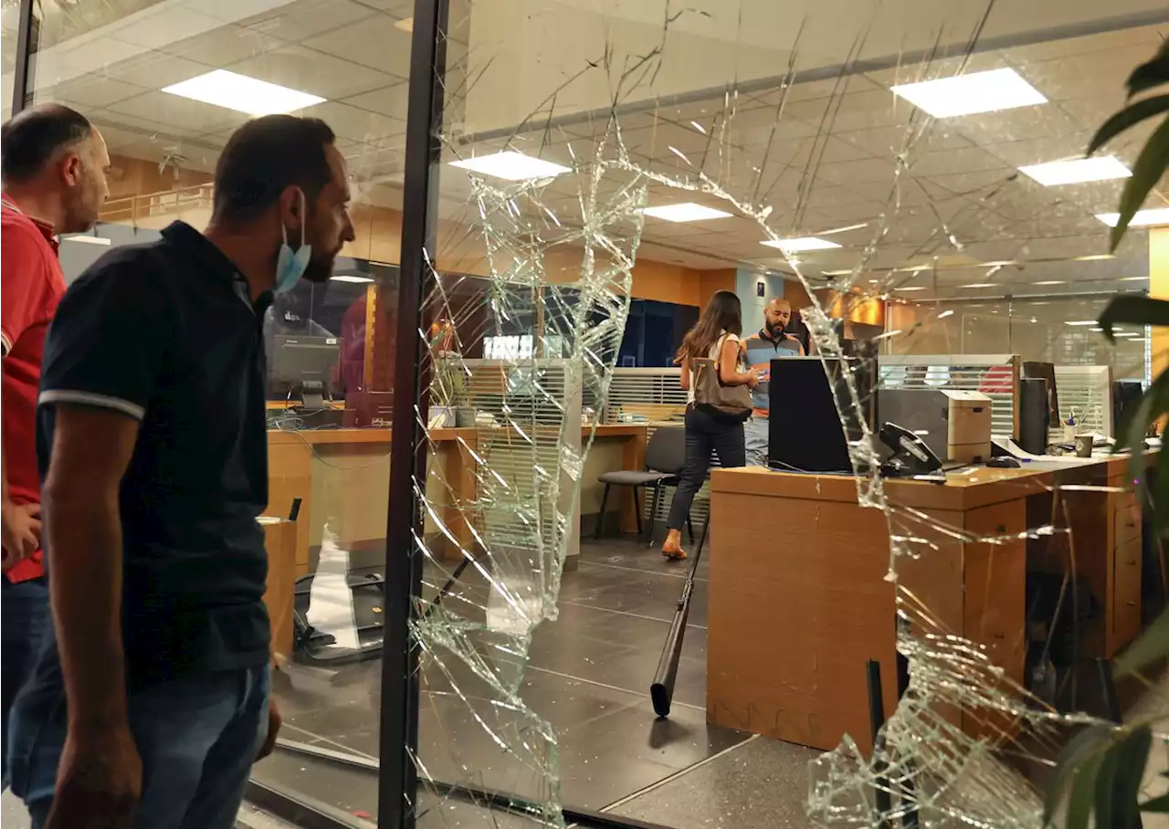 Woman with toy gun grabs trapped savings from Beirut bank