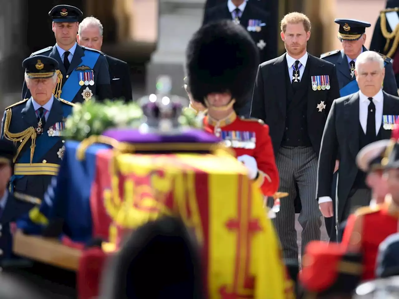 King Charles, William and Harry walk together behind Queen's coffin