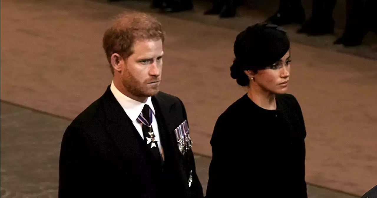 Harry and Meghan Hold Hands as They Exit Queen’s Westminster Hall Service