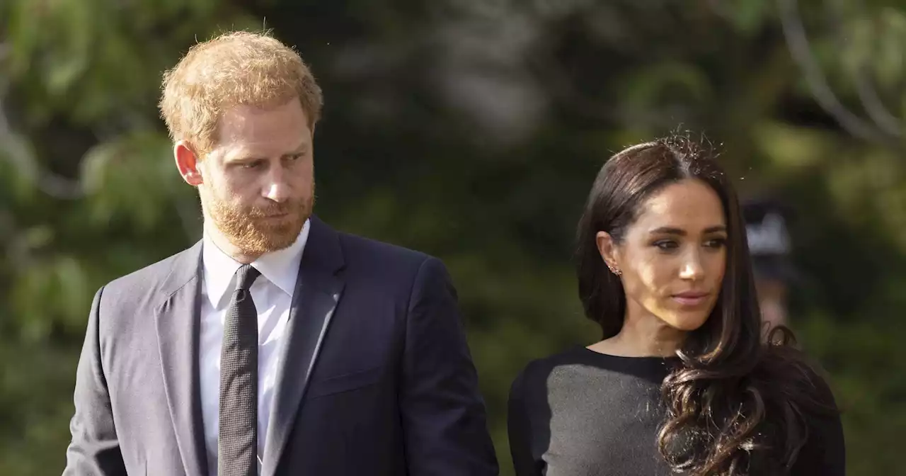 Meghan Markle and Prince Harry Receive Queen's Coffin With Royal Family