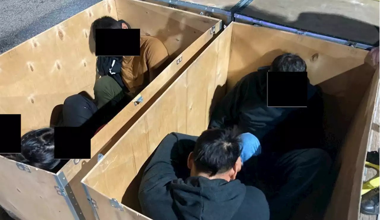 Human smugglers arrested for allegedly moving migrants in suitcases, water tanks