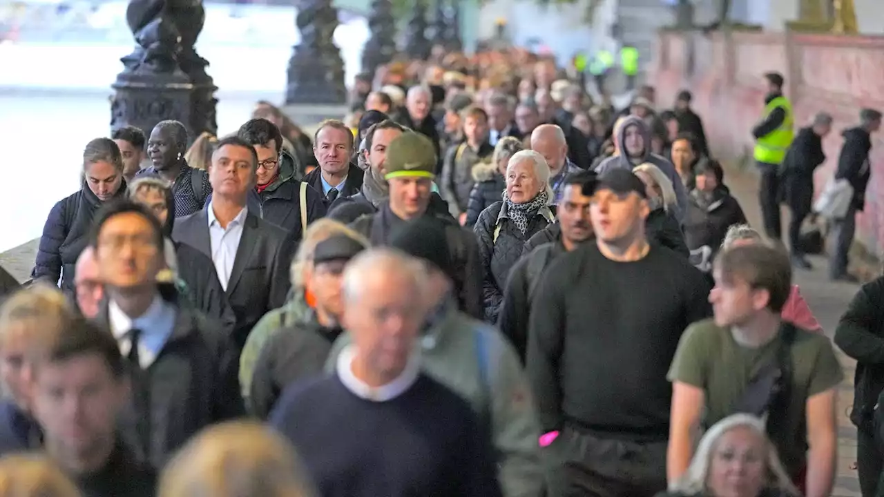 Crowds queue for Queen Elizabeth II's coffin as King Charles III spends quiet day