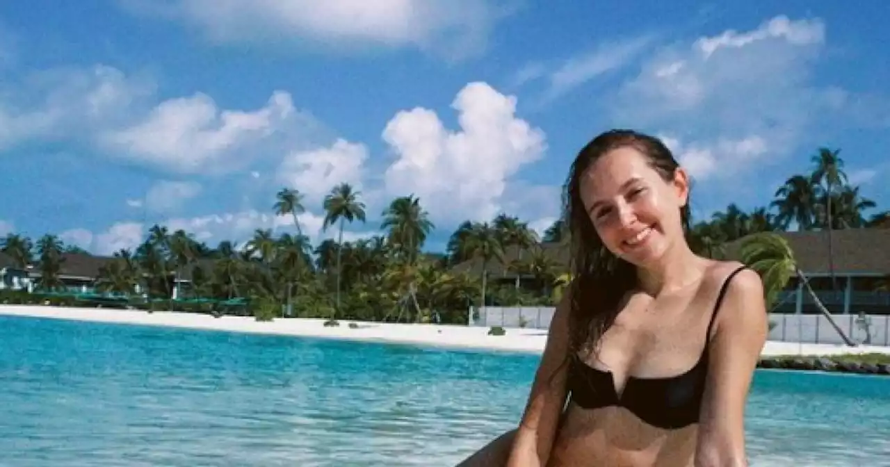 Rose Ayling-Ellis stuns in bikini beach snap as she ditches UK after 'split'