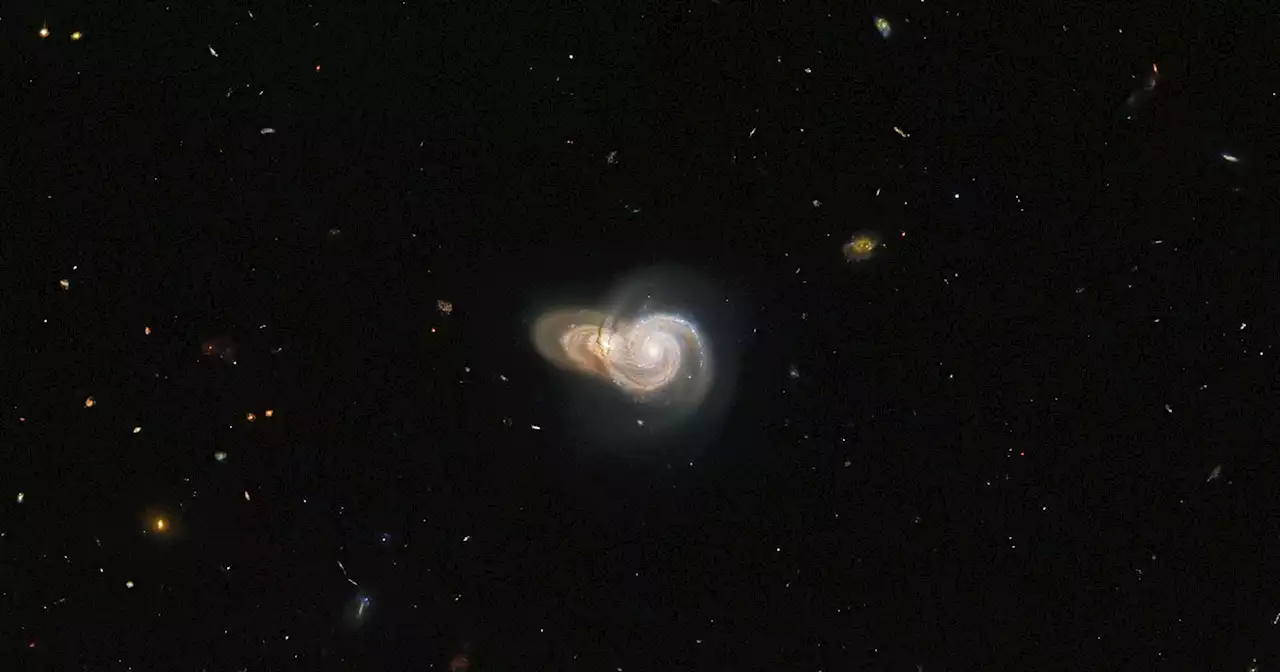 Hubble Captures Optical Illusion of Two Spiral Galaxies 'Colliding'