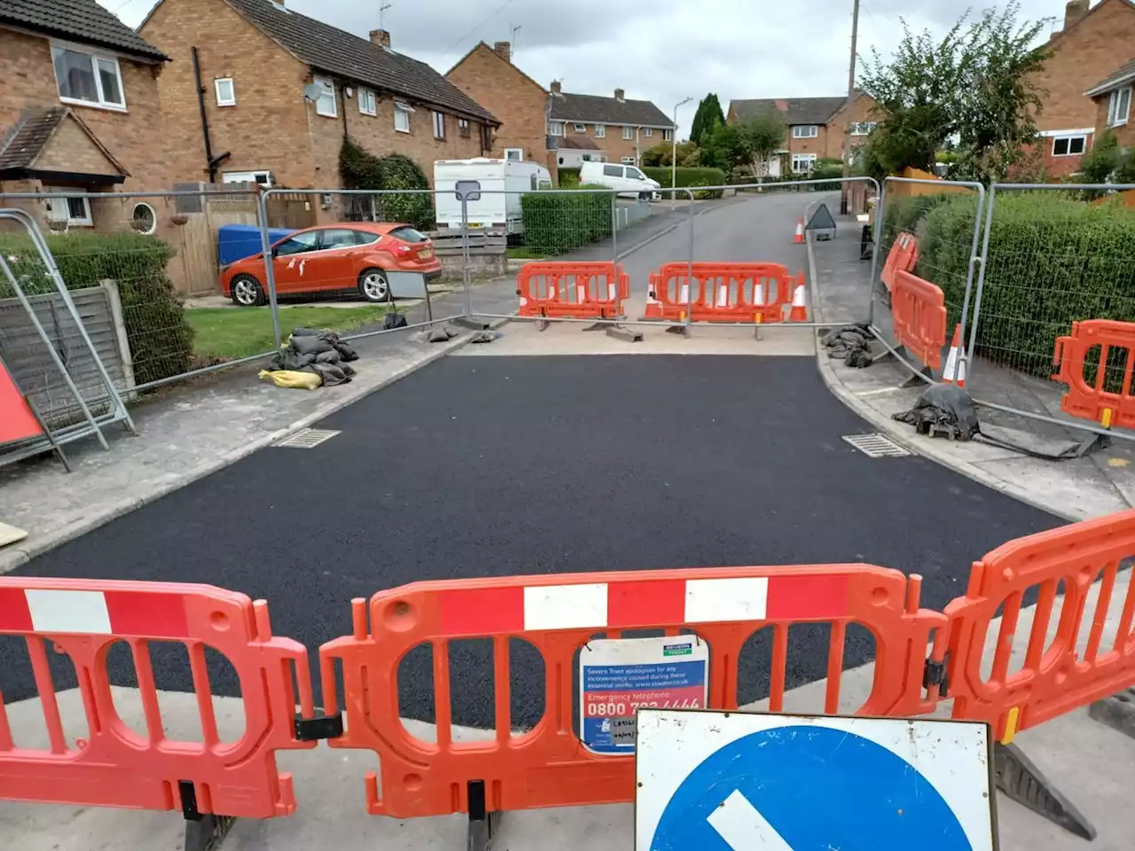 Huge sinkhole in middle of road is finally repaired two months after it appeared