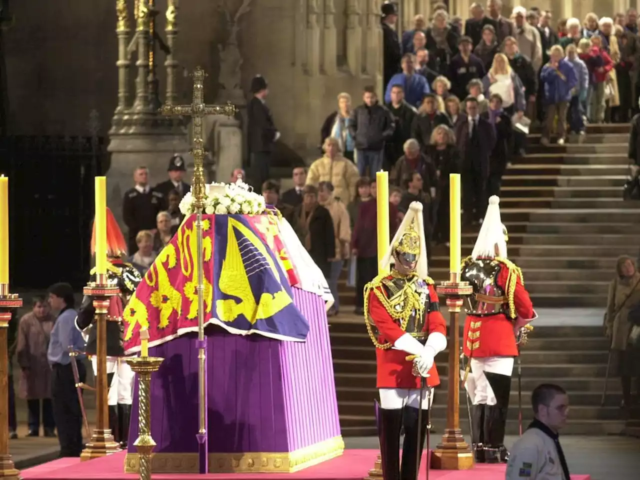 Silent crowds file past the coffin of the only British monarch most have known