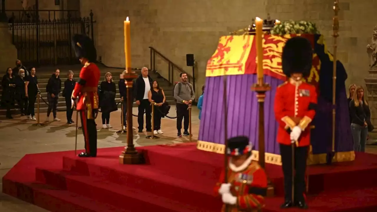 Thousands pass Queen Elizabeth's coffin as she lies in state in London