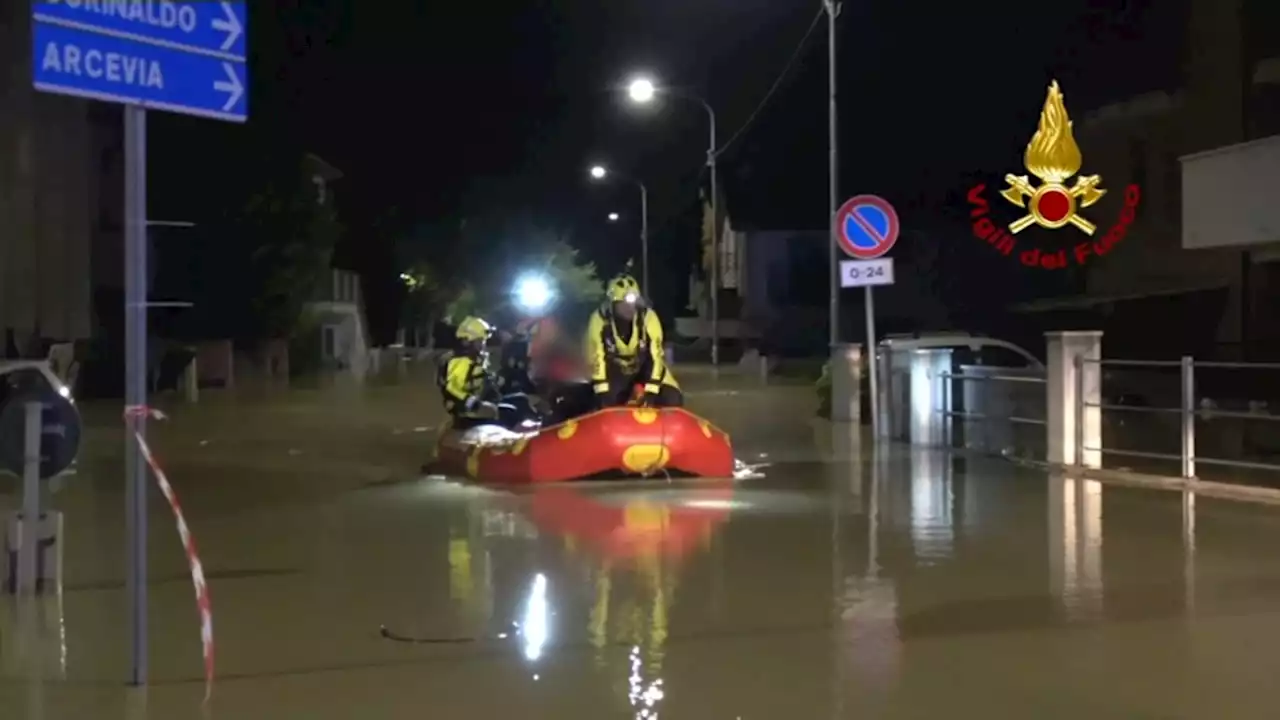 Italy flooding kills 10; about 50 hospitalized, as survivors plucked from roofs, trees