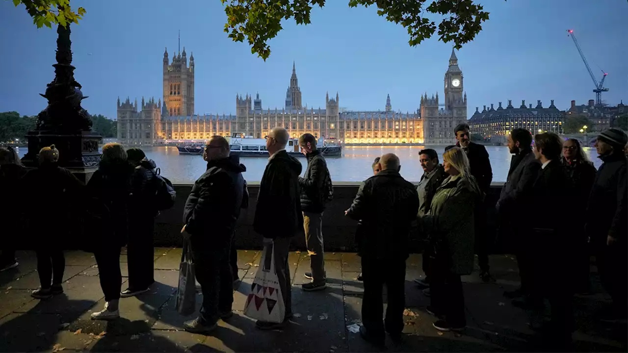 Crowds queue for Queen Elizabeth II's coffin as King Charles III spends quiet day