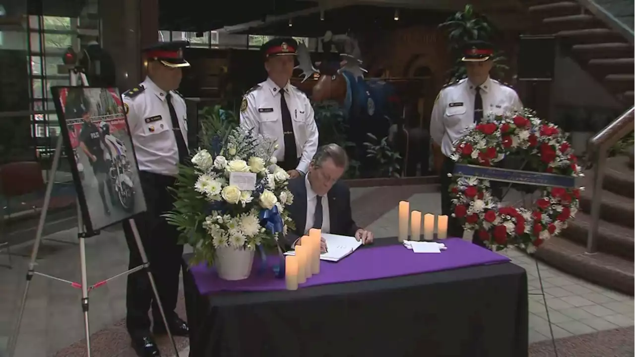 ‘Hong was and is a hero’: Tory signs book of condolences for slain Toronto officer