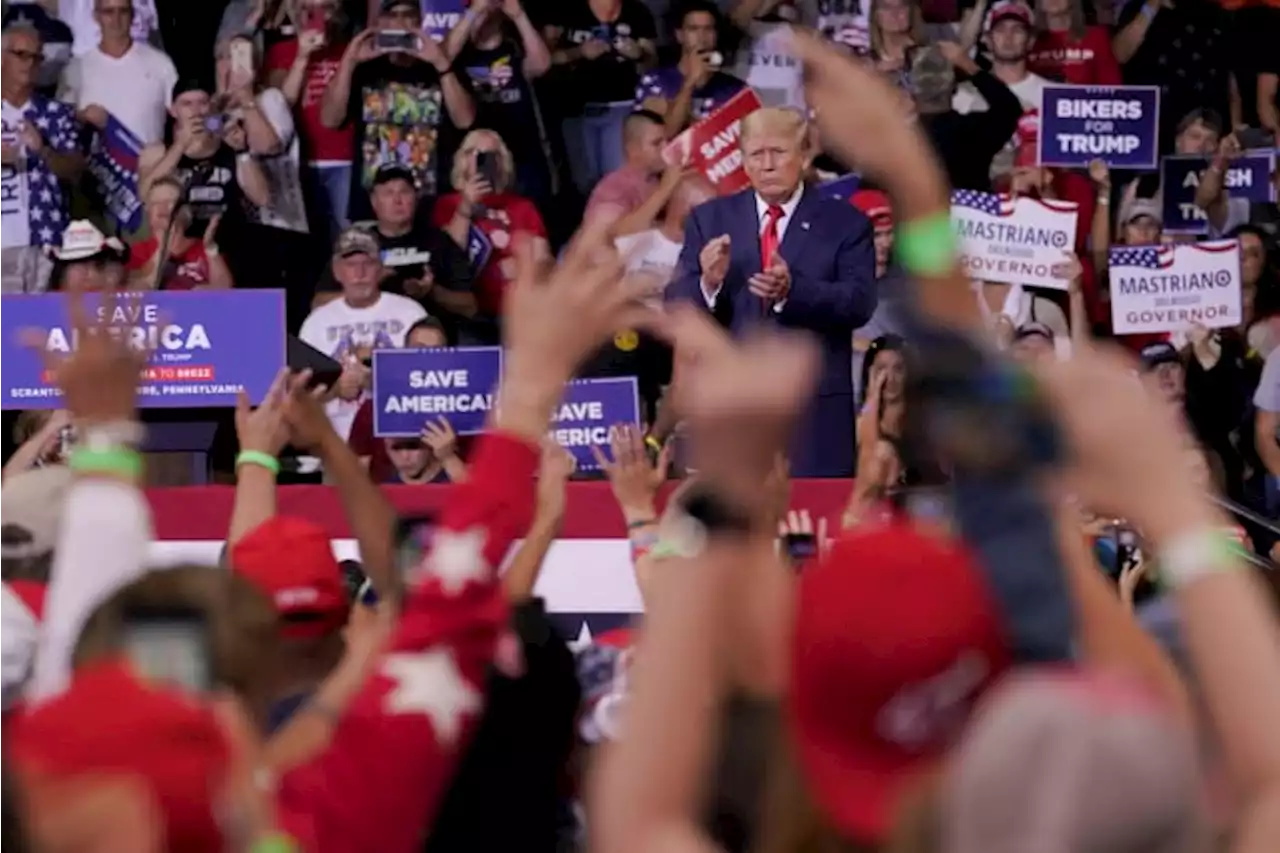 Trump openly embraces, amplifies QAnon conspiracy theories