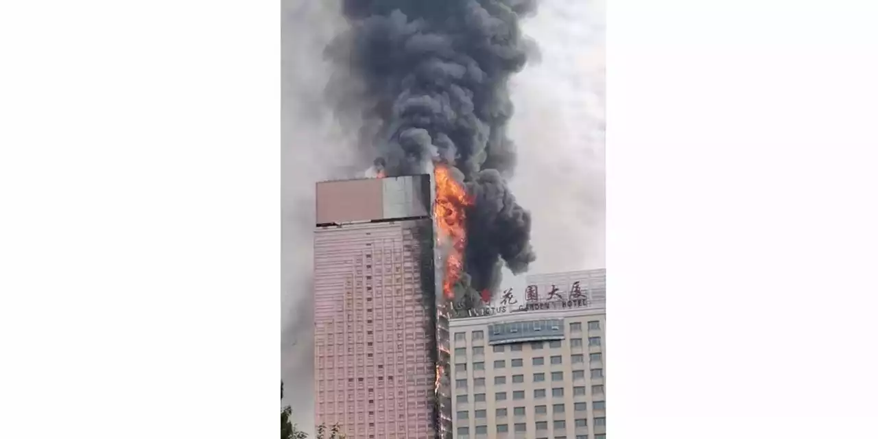 Fire engulfs 42-story building in China; no deaths reported