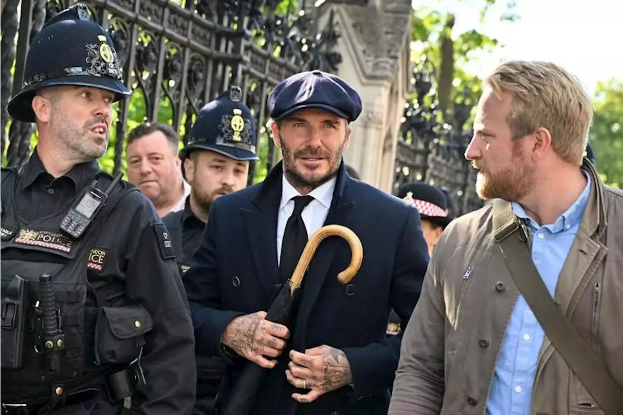 Former England soccer captain Beckham queues to see Queen Elizabeth's coffin