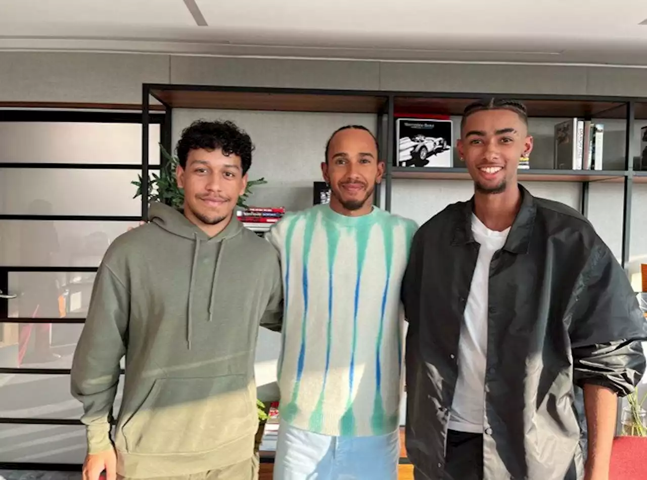 Dynamic duo meet their hero Sir Lewis Hamilton