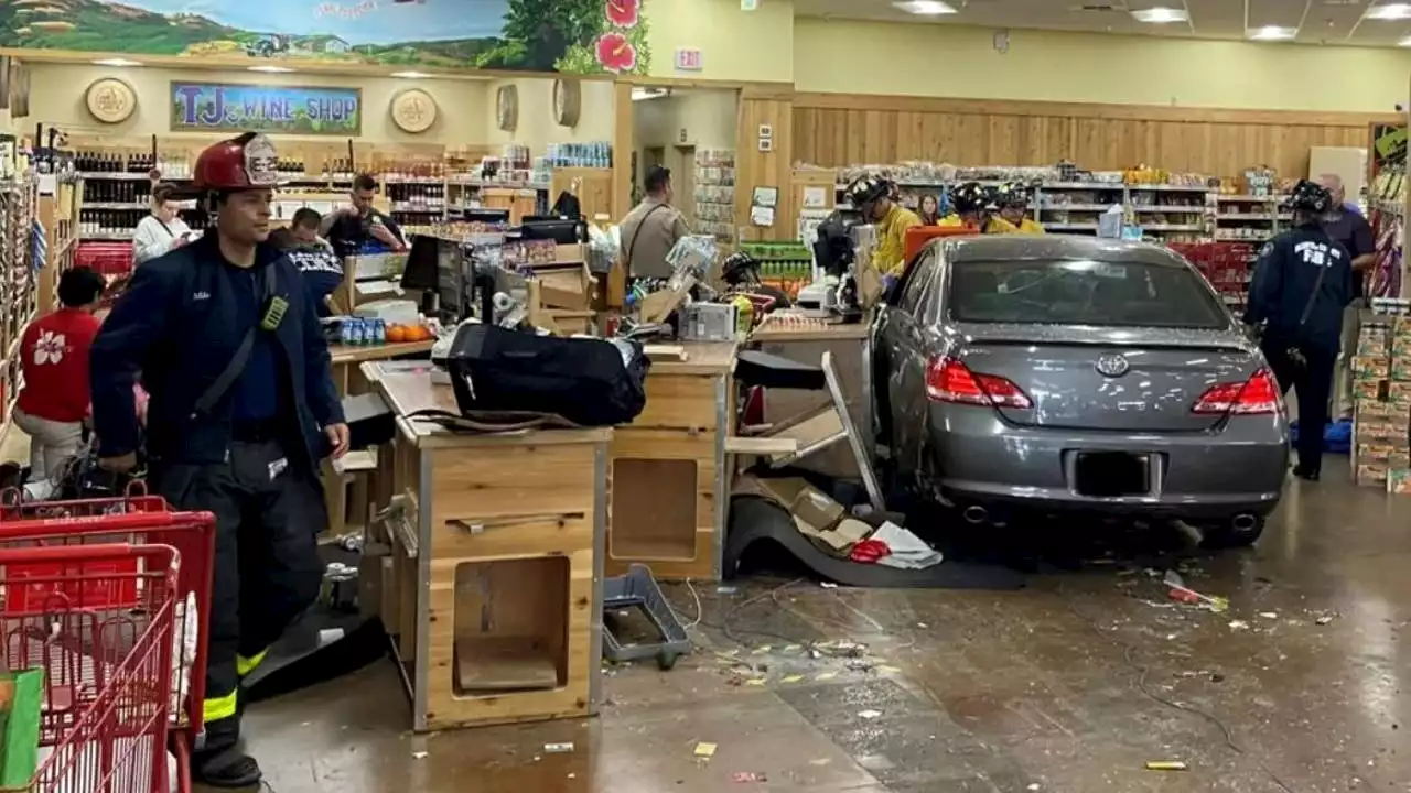 Car plunges into California Trader Joe's store, injuring 8 people