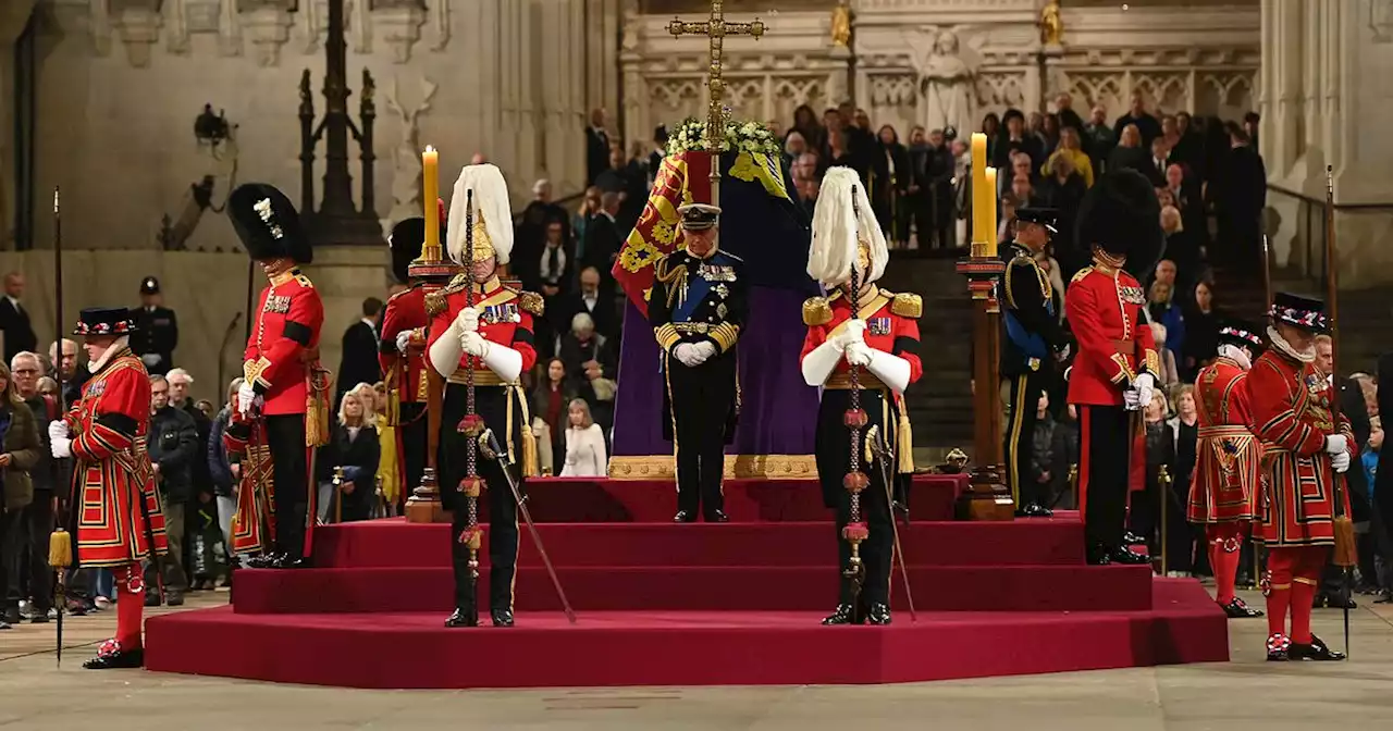 Man dragged to the ground after rushing at Queen's coffin