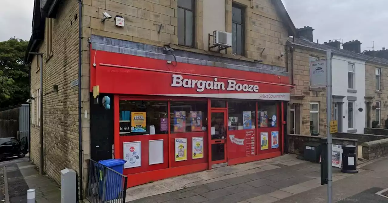 Bargain Booze staff threatened and robbed by man armed with weapon