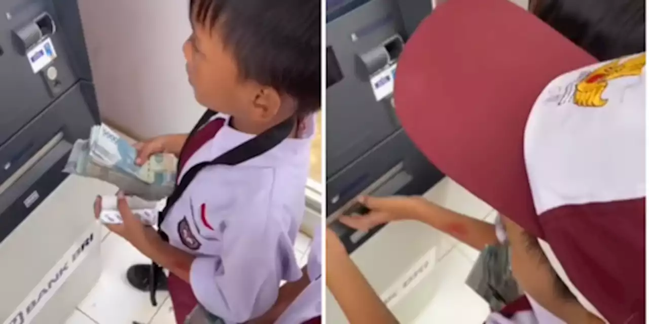 Viral Video Bocah SD Tarik Uang Segepok di Mesin ATM, Aksinya Bikin Melongo | merdeka.com