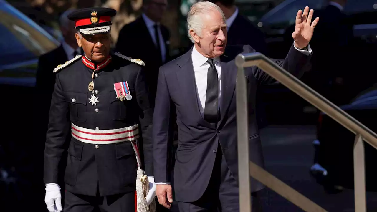 Live updates: King greets crowds waiting to visit late queen