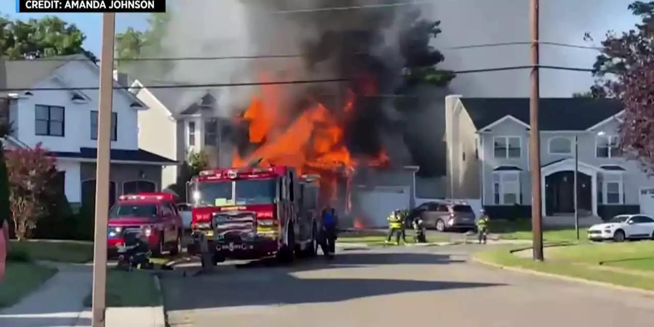 Amazon delivery driver helps family escape burning home