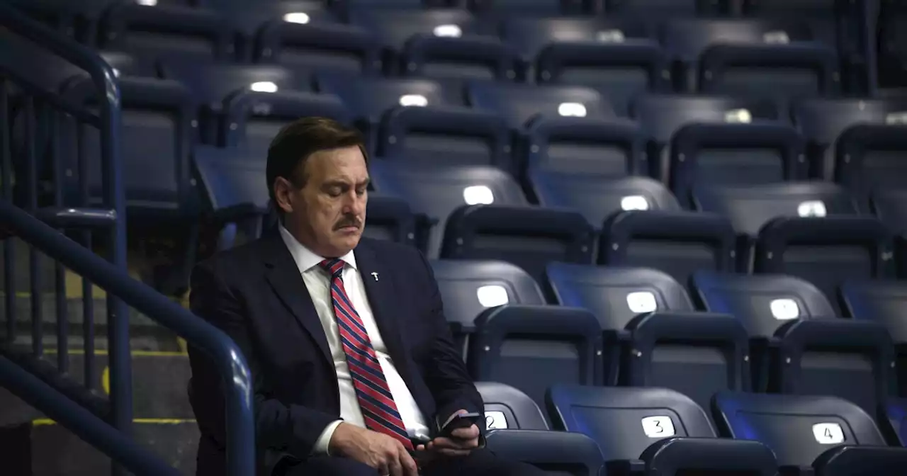 New phone, huge diss: Mike Lindell spotted with cell after claiming FBI seized his