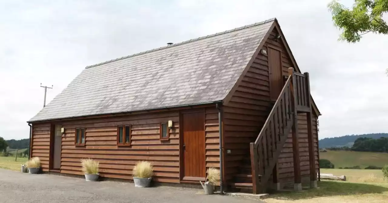 Stay in a 'charm-filled log cabin' in a 'peaceful location'